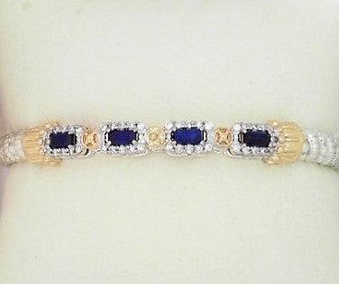 Metal: 14Karat Gold & Sterling Silver Closed End 4MM Bracelet With 4- Baguette Sapphires With Diamond Weight: 0.27 CTW