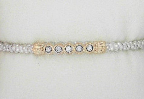 Metal: 14Karat Yellow Gold & Sterling Silver 2mm Bangle Open Bottom Diamond Weight: 0.15