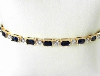 Ladies 14 Karat Yellow Gold Flexible Bangle Bracelet  With = 2.28Tw Emerald Cut Sapphires And = 0.67Tw Round G/H SI2 Diamonds 6.75
