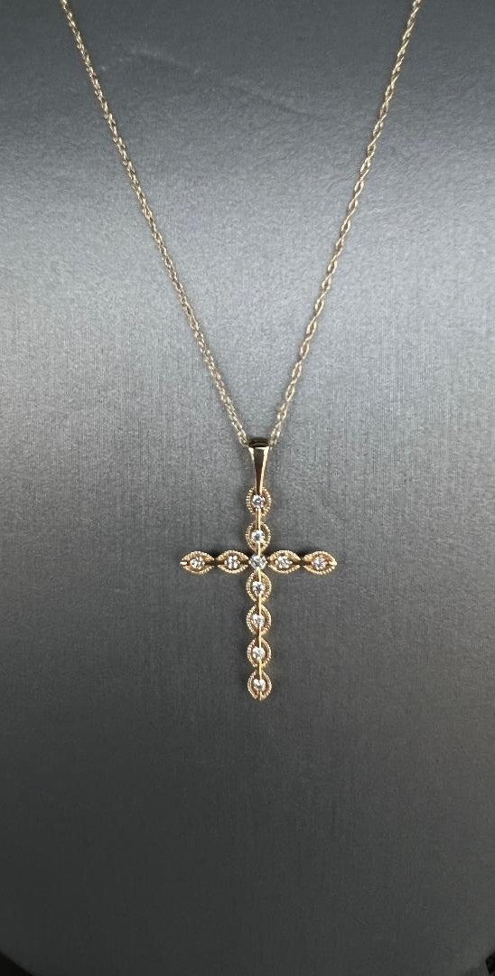 Ladies 14 Karat Yellow Gold Cross Pendant Diamond  With 0.15Tw Round H/I SI2 Diamonds With a 18