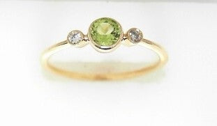 Ladies 14 Karat White Gold With = 0.28Tw Round Peridots And = 0.04Tw Round H/I Si2 Diamonds Size 7.5