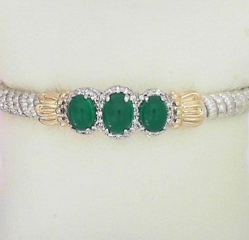 Ladies Sterling Silver and 14 Karat Yellow Gold 4MM Closed End Bracelet With Green Onyx 3 - Oval and  .029CT of Round Diamonds SI2 G/H Color