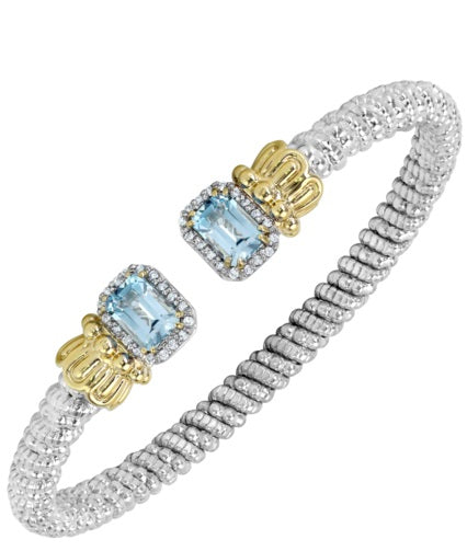 Ladies 14K Gold And Sterling Silver Open End Bracelet 4MM  With Sky Blue Topaz 7x5l And 0.18 Pts Si2 G To H In Color Of Diamonds