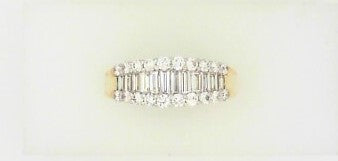 Ladies 14 Karat Yellow Gold Diamond Band With = 0.53Tw Baguette G/H SI2 Diamonds And = 0.51Tw Round G/H SI2 Diamonds = .1.04 CTW  Size 7.5