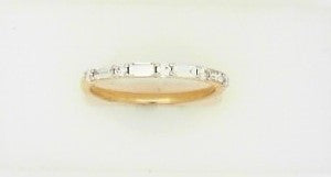 Ladies 14 Karat Yellow Gold Diamond Band With = 0.24Tw Baguette G/H SI2 Diamonds And = 0.13Tw Round G/H SI2 Diamonds = .37 pts.  Size 7.5