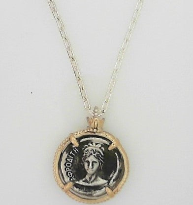 Metal: 14Karat Yellow Gold & Sterling Silver Coin Pendant 18