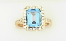 Ladies 14 Karat Yellow Gold Fashion Ring With = 0.40Tw Round G/H SI2 Diamonds And = 2.75 Tw Emerald Cut Blue Topaz Size 6.5
