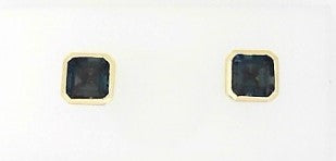 Ladies 14 Karat Yellow Gold Bezel Set Studs With = 2.65Tw Emerald Cut Blue Topaz