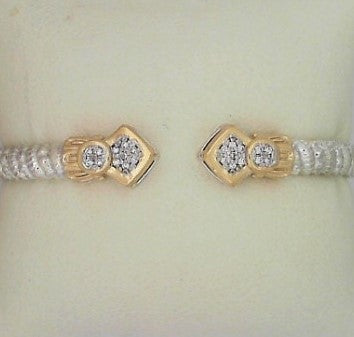 Metal: 14Karat Yellow Gold & Sterling Silver Open End 4MM Bangle Diamond Weight: 0.17 pts