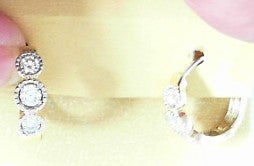 Ladies 14 Karat Yellow Gold Diamond Small Oval Hoop Earrings With 0.65Tw Round H/I Si2 Diamonds
