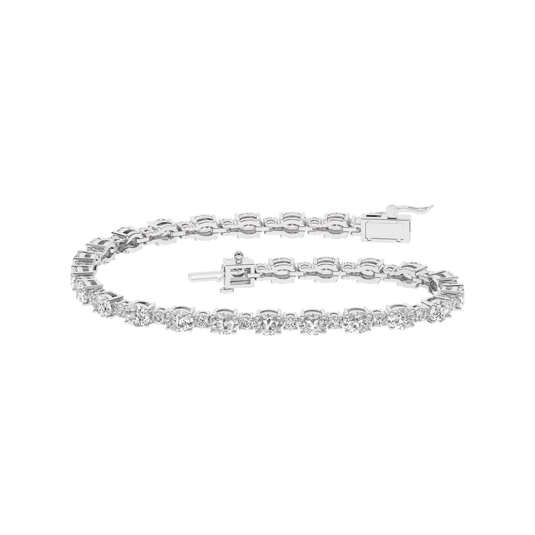 Ladies 14 Karat White Gold Diamond Tennis Bracelet With 6.00Tw Oval and Rounds E/F VS2 Diamonds Lab Grown Certification # 61J998102410