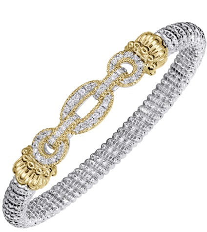 Ladies 14 Karat Yellow Gold And Sterling Silver Closed Bracelet with SI2 G to H in Color  0.40 Pts. of Diamonds
