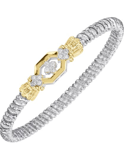 Ladies 14 Karat Yellow Gold And Sterling Silver Closed Bracelet with SI2 G to H in Color  0.18 Pts. of Diamonds