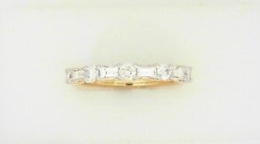 Ladies 14 Karat Yellow Gold Diamond Band With = 0.41Tw Baguette G/H SI2 Diamonds And = 0.40Tw Round G/H SI2 Diamonds = .81 pts.  Size 7.5