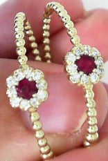 Ladies 14 Karat Yellow Gold Large hoop Earrings With 0.26Tw Round H/I Si2 Diamonds And 0.38Tw Round Rubies