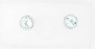 Ladies 14 Karat White Gold Halo Studs With = 2.25Tw Round Light Blue Topaz And = 0.08Tw Round G/H SI2 Diamonds