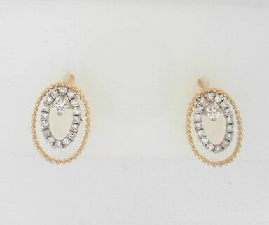 Ladies 14 Karat Two Tone Diamond Oval Earrings With  0.29tw Round G/H SI2 Diamonds