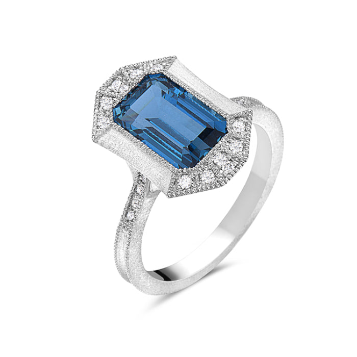 Ladies 14 Karat White Gold Fashion Ring With 2.69Tw Emerald Cut London Blue Topaz And 0.10Tw Round H/I Si2 Diamonds Size 7